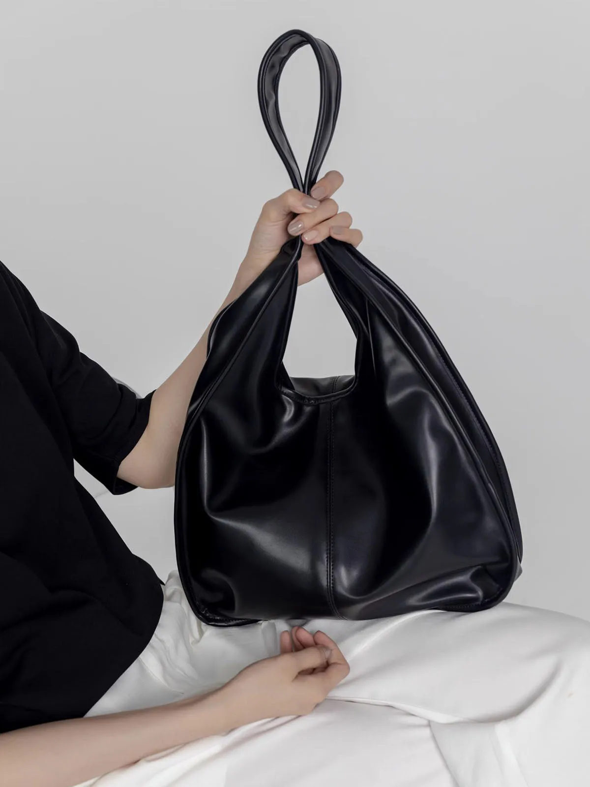 Large Capacity Egg-Shaped Silhouette Black Tote Bag